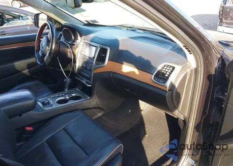 2013 Jeep Grand Cherokee Overland z USA, uszkodzony, nr VIN 1C4RJFCG7DC522421